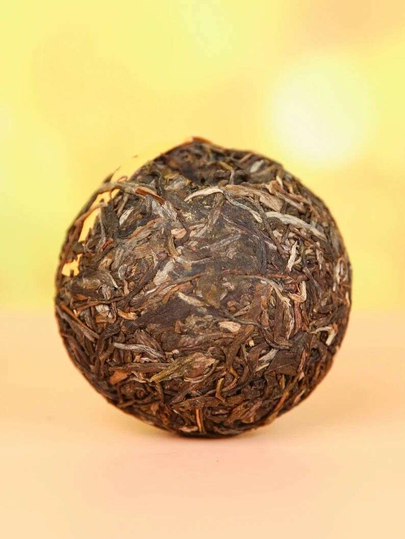 金丝沱茶二十年经典传承,布朗古树料成就茶中传奇 下关金丝沱茶 二十年经典再现,一缕金丝,万重茶香!