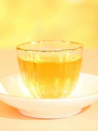 金丝沱茶二十年经典传承,布朗古树料成就茶中传奇 下关金丝沱茶 二十年经典再现,一缕金丝,万重茶香!